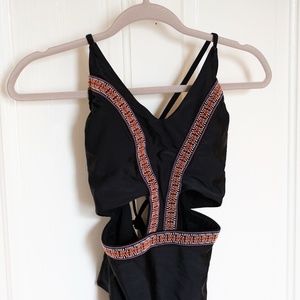One-piece swimsuit with cut-outs, embroidered trim